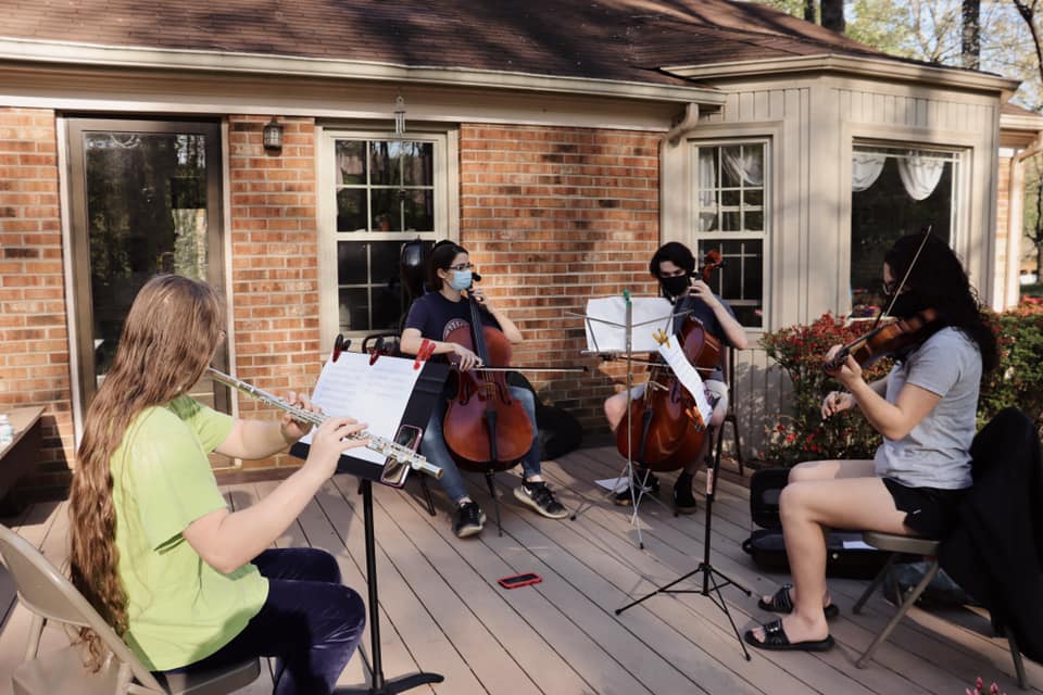 LSYO strings rehearse outdoors